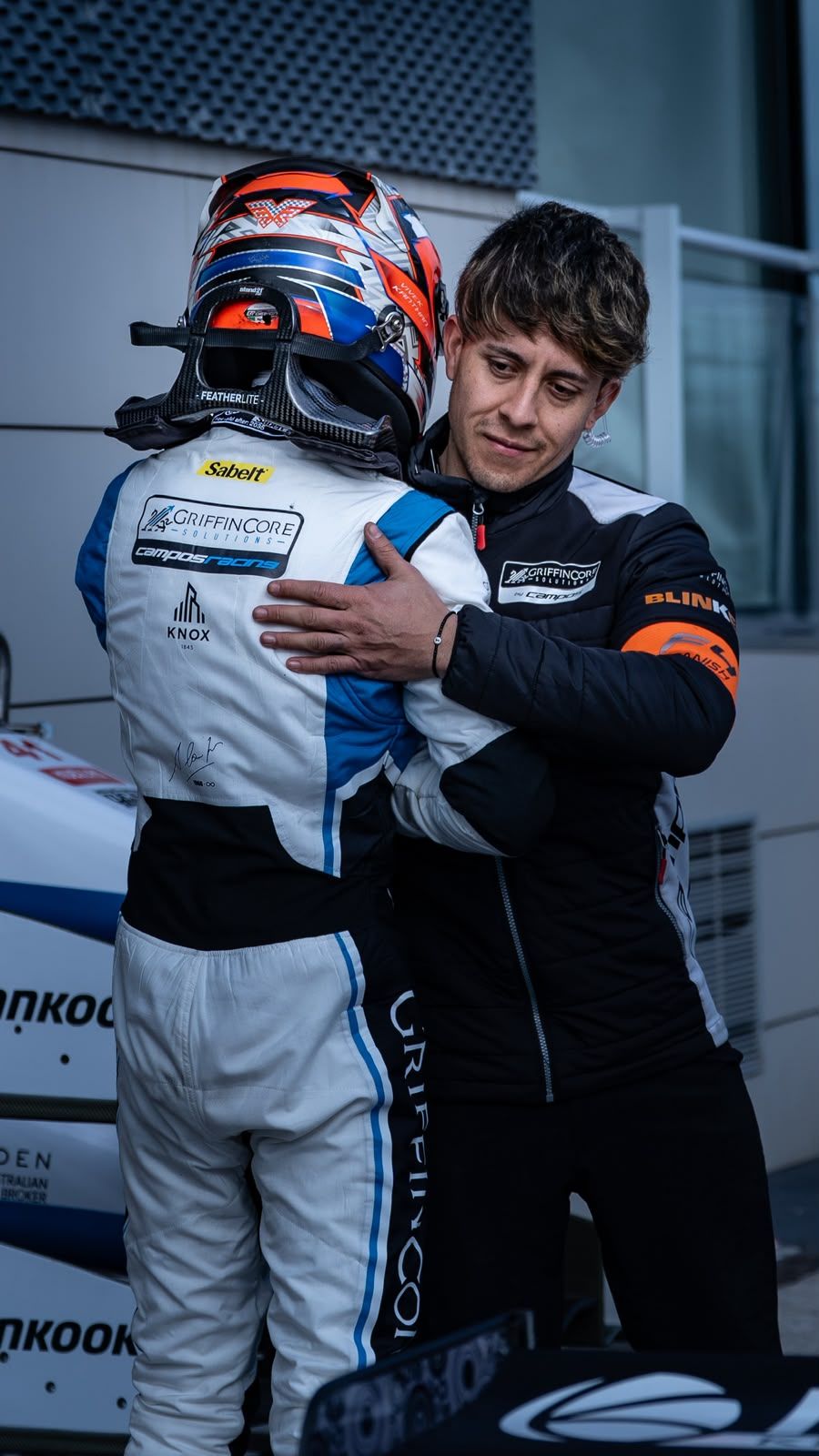 Bryan hugging his driver after a race